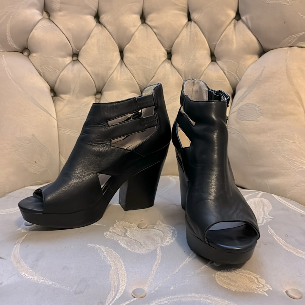 TopShop black leather platform peep toe chunky heels.